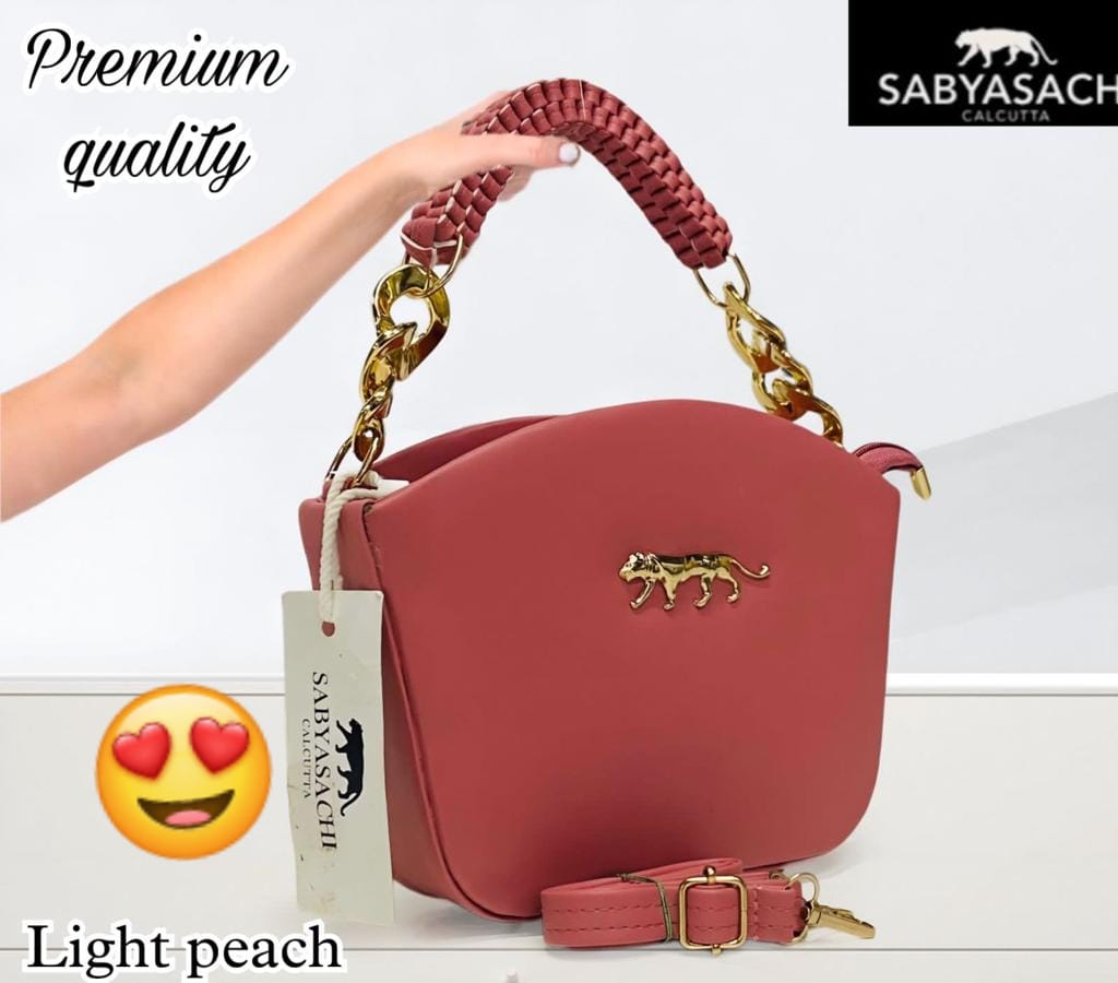 Regal Radiance: Sabyasachi Sling Bag with Weaved Handle